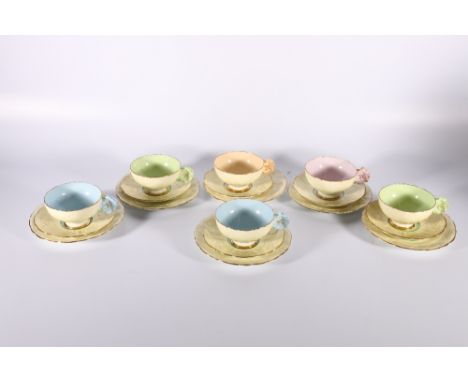 Collection of 1930's Paragon China comprising six cups, six saucers and six plates, cream embossed pansy ground with contrast