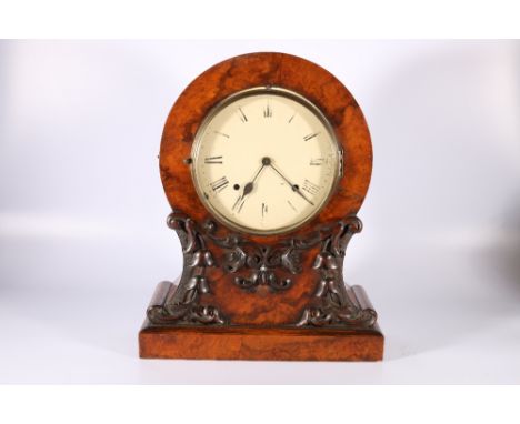 Victorian walnut mantle clock in balloon shaped case with applied carved scroll motifs, 45cm tall 