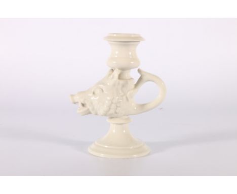 Meissen style blanc de chine wild boar's head candlestick, 16cm. Rough patches under rim, small pits to base, chip under rim.