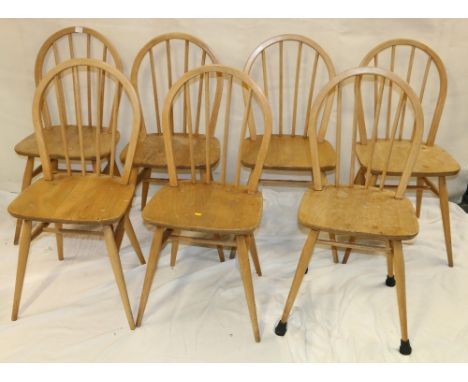 Set of seven Ercol dining chairs.