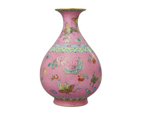 A FINE CHINESE FAMILLE-ROSE PINK GROUND VASE enamelled in polychrome with butterflies and flowers, on a pink sgraffito ground