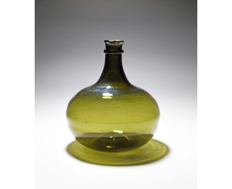 A large green glass bottle or carboy, late 18th/early 19th century, the globular body of a green tone, with slight kick-in ba