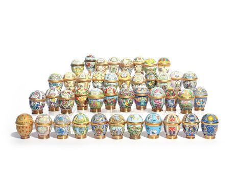 A collection of forty-two Halcyon Days enamel Easter eggs, modern, comprising a near complete run from 1974 to 2016 (omitting