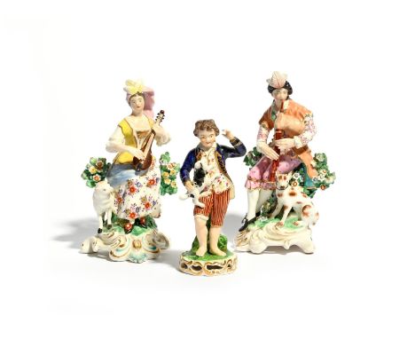 A matched pair of Derby figures of musicians, early 19th century, he seated and playing the bagpipes, she the lute, each wear