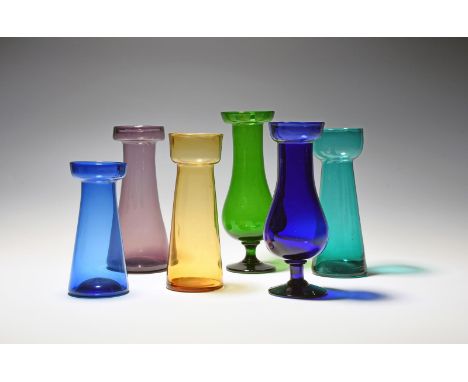 Six coloured glass hyacinth bulb vases, 19th century, four of tapering form with swollen necks, two of baluster form, raised 