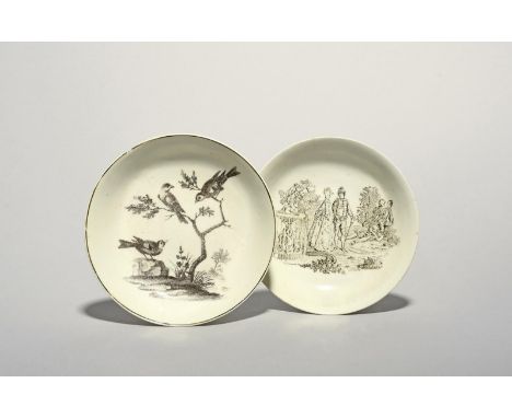 Two Worcester saucers, c.1753-58, one of Smoky Primitive type, printed with La Cascade with a couple walking in a garden besi