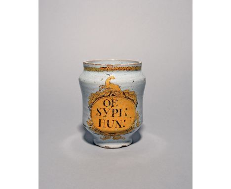 A small Delft albarello, late 18th century, the slightly waisted form decorated with a cartouche inscribed 'OE SYPI: HUN:' in