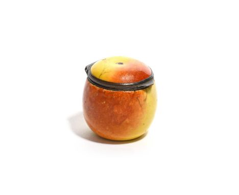 A small enamel fruit bonbonnière, c.1770-90, modelled as an apple decorated with russet patches on a yellow ground, the under