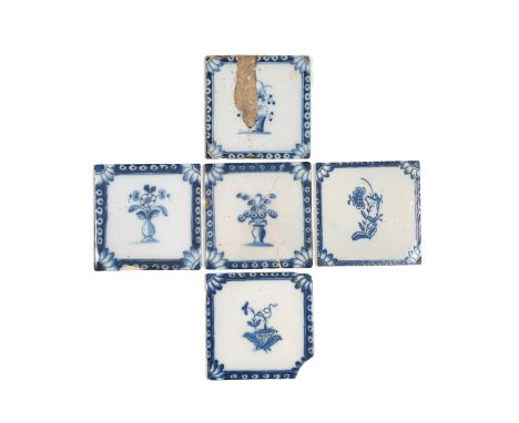 Five Bristol delftware tiles, c.1750-70, painted in blue, three with vases of flowers, two with flowering plants, all within 