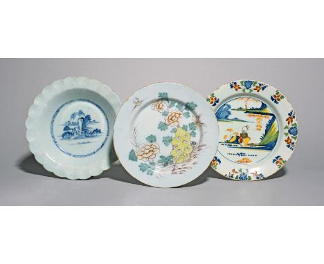 Three delftware plates, c.1760, one Lambeth (Abigail Griffiths) and painted with a Chinese figure seated in a landscape, anot