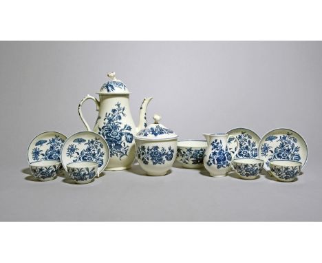 A Worcester blue and white part tea or coffee service, c.1770-80, printed with the Three Flowers pattern, hatched crescent ma