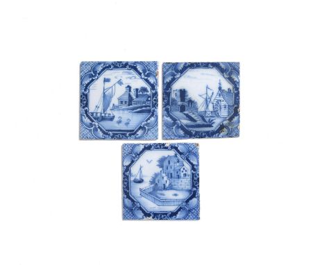 Three Liverpool delftware tiles, c.1750-75, painted in blue with octagonal panels of buildings and boats, one with a water mi