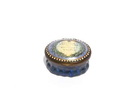 An English enamel commemorative patch box, late 18th/early 19th century, the oval form painted to the cover with a laurel wre