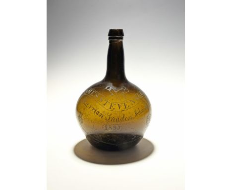 A Scottish chip engraved wine bottle, dated 1835, of shaft and globe form, decorated with carpenter's tools and the inscripti