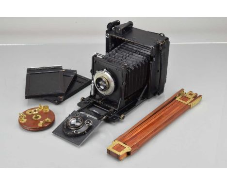 An Anniversary Speed Graphic 4x5'' Camera, all black, serial no E81681, focal plane shutter working, body G, some paint wear/