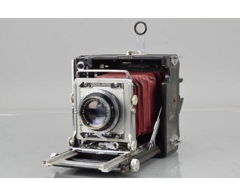 A Graflex Century Graphic 2¼ x 3¼'' Camera, serial no 526057, body G, fading to leatherette, adapted body release catch, rang