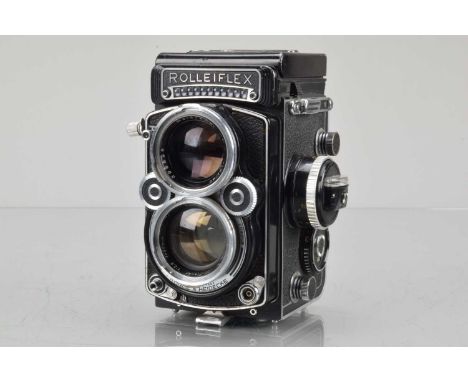 A Rolleiflex 2.8F TLR Camera, serial no 2.8F 2443168, shutter working, light cell responsive, self timer working, body G, pai