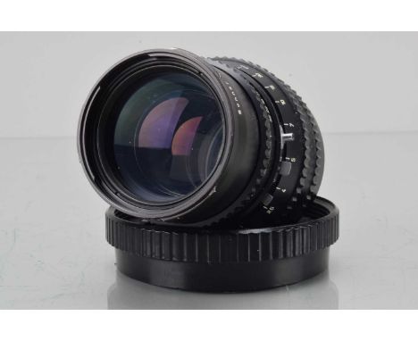 A Hasselblad Carl Zeiss C T* 150mm f/4 Sonnar Lens, serial no 5758871,  shutter working, barrel G, some light paint wear to f
