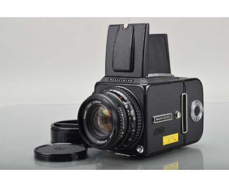 A Hasselblad 500C/M Camera, black, serial no UR 1210889, shutter working, body G-VG, some slight paint wear to edges, with Ca