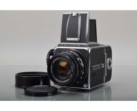 A Hasselblad 500C/M Camera, chrome, serial no serial no RH 126462, shutter working, body G-VG, with Carl Zeiss C T* 80mm f/2.
