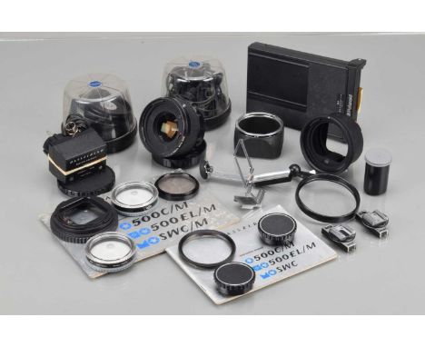 Hasselblad Accessories, including a 43028 sports finder, two 43125 flash shoes, two 44024 winding knobs, 32 & 10 extension tu