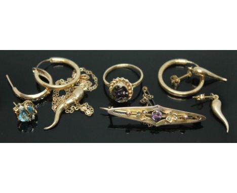 A mixed lot comprising a brooch marked '9ct', a hallmarked 9ct gold ring, a hallmarked 9ct gold odd ear stud set with a blue 