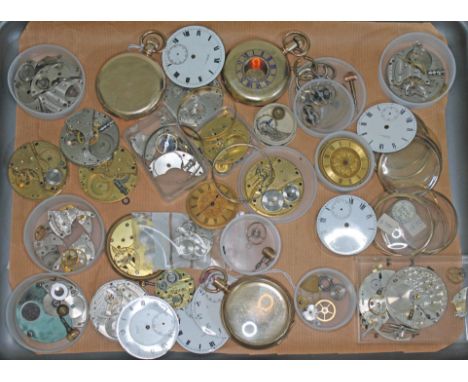 A tray of pocket watch spares.  