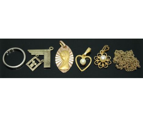 A mixed lot comprising a white metal wedding band marked '0750' wt. 2.24g size J/K, a hallmarked 15ct gold Masonic pendant wt