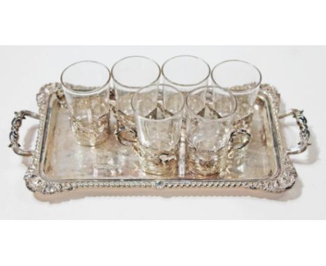 An Edwardian liqueur set comprising a twin handle tray with gradrooned border and six silver mounted glasses, Atkin Brothers,