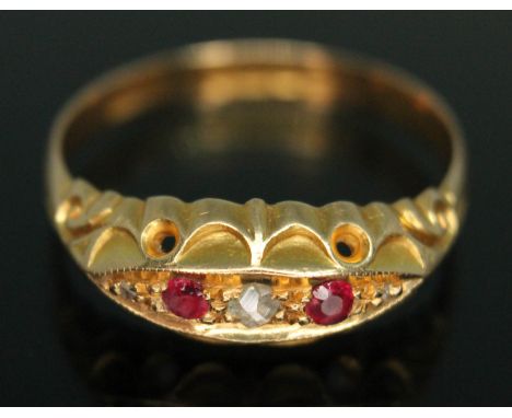 An early 20th century diamond and garnet ring, hallmarked 18ct gold, sponsor's mark 'F.H.L.', Birmingham 1918, gross wt. 2.64