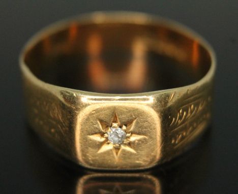 A gent's hallmarked 18ct gold ring set with a diamond, gross wt. 4.98g, size U.  Condition - band slightly odd shaped and wor