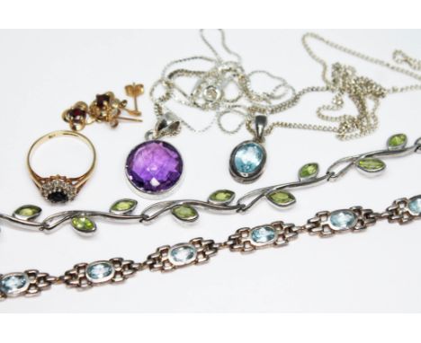 A mixed lot of jewellery including a hallmarked 9ct gold heart shaped cluster ring, a pair of yellow metal drop earrings, an 