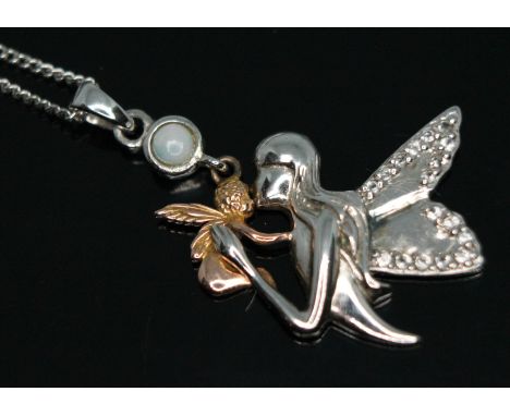 A Clogau Welsh silver and gold pendant modelled as an angel holding a baby angel in her arms, suspended below a round preciou