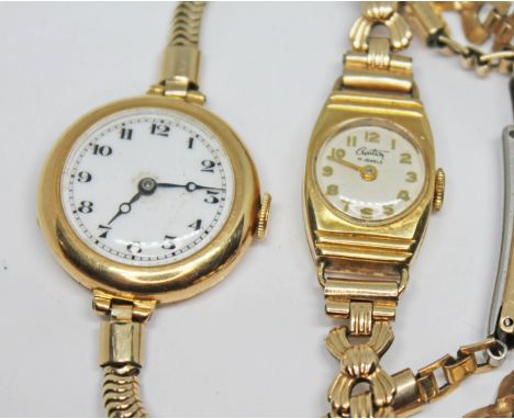 Two 18ct gold ladies wristwatches comprising of an early 20th century hallmarked 18ct gold wristwatch with unsigned white ena