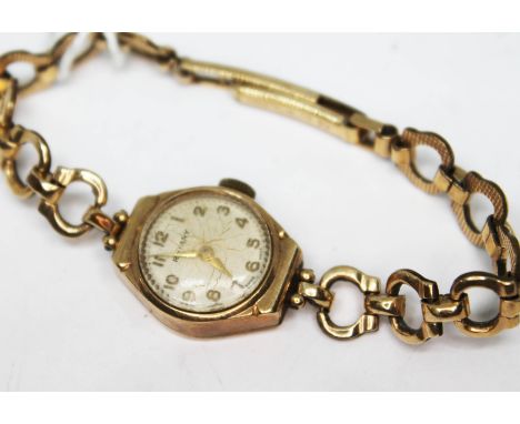 A vintage hallmarked 9ct gold Rotary 17 jewel manual wind ladies wristwatch on rolled gold strap, gross weight (without movem