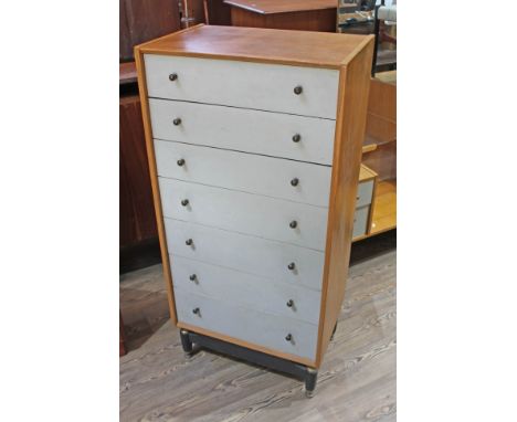 A G-Plan light oak and painted tall chest of drawers with brass knobs and black base, width 60.5cm, depth 41cm &amp; height 1
