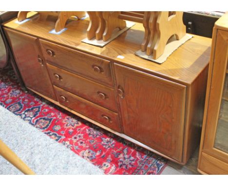 An Ercol blonde elm sideboard.  Condition - good, general wear.