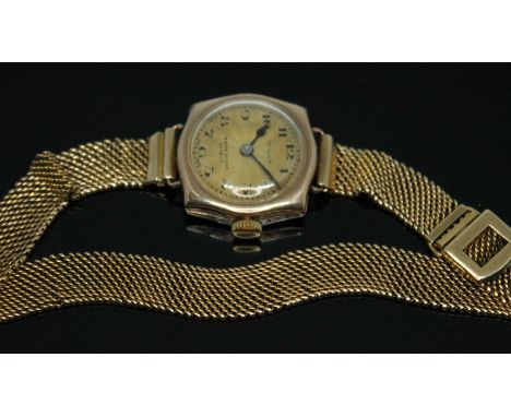 A 1920s Rolex Prima 9ct gold ladies wristwatch having double signed guilloche dial for retailer Winsor Bishop, Norwich, Arabi