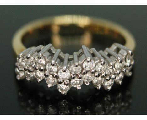 A diamond cluster ring, marked '18ct', gross weight 3.32g, size I.  