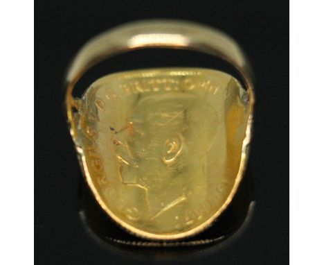 A George V 1912 half sovereign ring, band unmarked, gross wt. 4.28g, size J/K.  Condition - a little worn but appears undamag