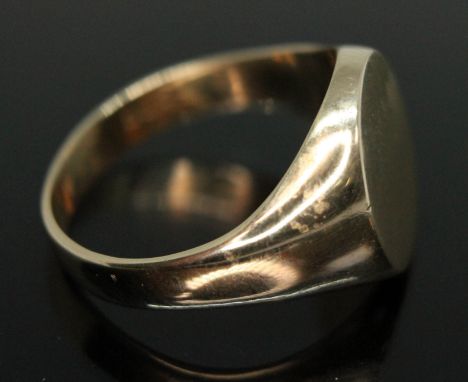 A hallmarked signet ring, wt. 9.77g, size W/X.  Condition - marks rubbed but appears to be 9ct gold, general wear throughout.