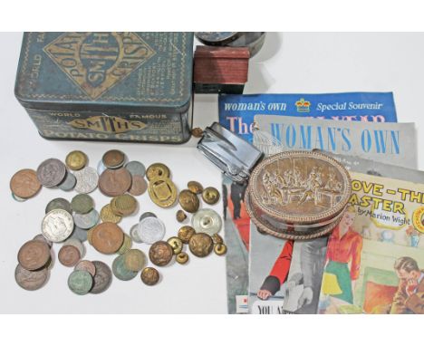 A mixed lot comprising military buttons, coins, ephemera, a tin, a lighter etc.  