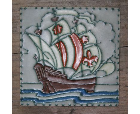 A Pilkington's 4" tile with tube lined decoration depicting a galleon.  Condition - very good, light crazing and minor nibble