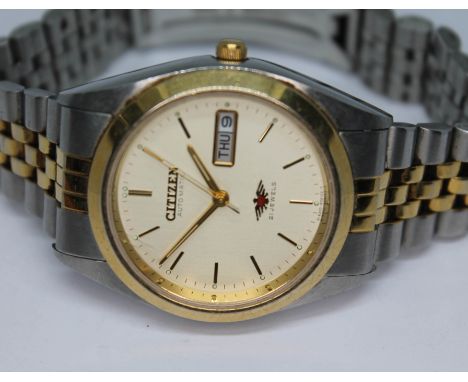 A 1970s stainless steel Citizen Eagle 7 automatic wristwatch, ref. GN-4W-S, with signed champagne dial, gold tone hour marker