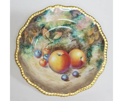 A Royal Worcester porcelain cabinet plate, hand painted decoration depicting fruit signed P Owen, gadrooned gilt border, diam