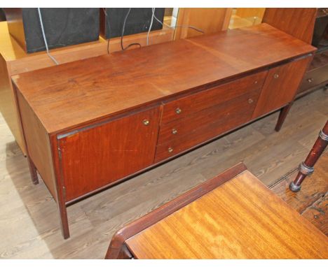 A teak sideboard by Heals, three central drawers with brass ring pull knobs and two cupboards either side, length 183cm, dept