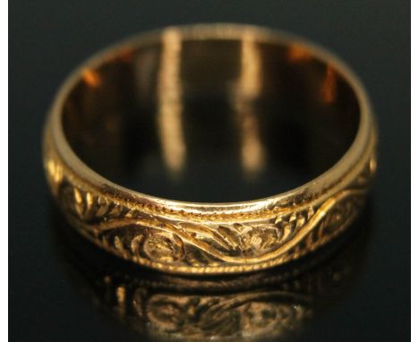 A 22ct gold engraved wedding band, sponsor's initials 'SH', Birmingham 1925, wt. 4.71g, size Q/R.  Condition - good, general 