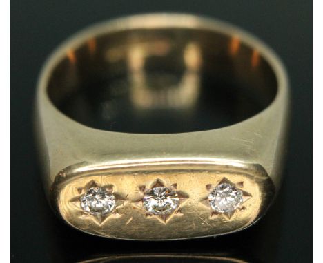 A hallmarked 9ct gold three stone diamond ring, total approx. diamond weight 0.24 carats, gross wt. 10.65g, size U.  Conditio