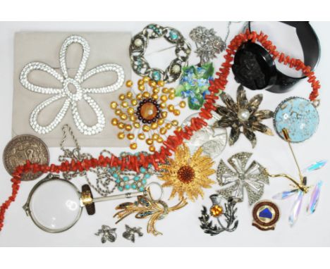 A mixed lot comprising a 19th century hair and yellow metal ring, a Swarovski dragon fly brooch (two wings broken) and anothe