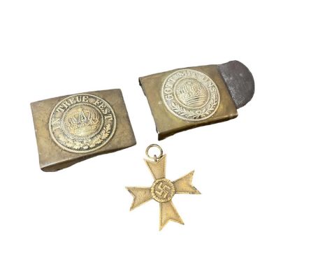 Two First World War Imperial German Army belt buckles, together with a Nazi German War Merit Cross (no swords) (3).
